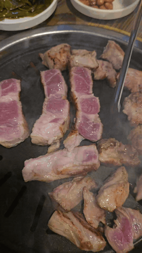 Animated geungogi meal at the Daegu restaurant