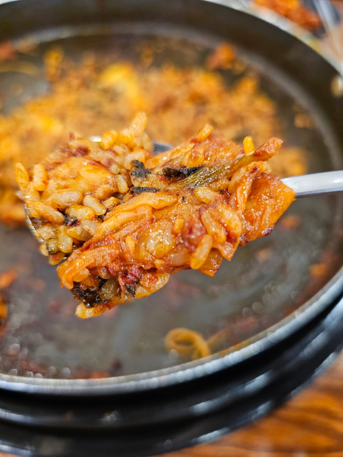 Close-up spoonful of spicy fried rice after dakgalbi in Daegu