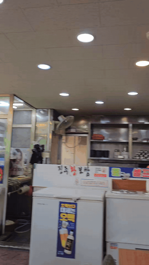 Interior view showing the working restaurant space at Jinju Wang Bossam