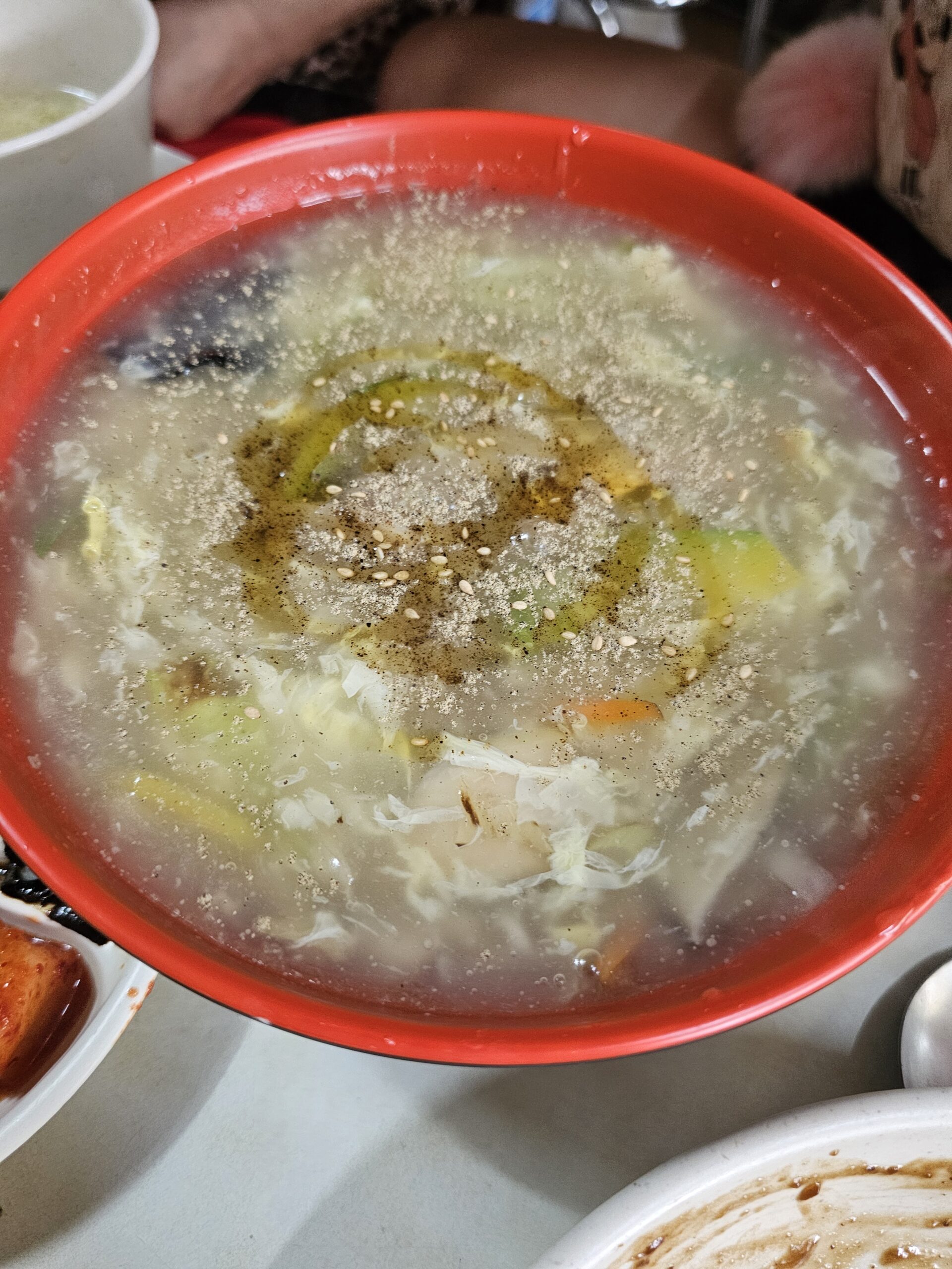 Swirl of sesame oil on Ulmyeon broth