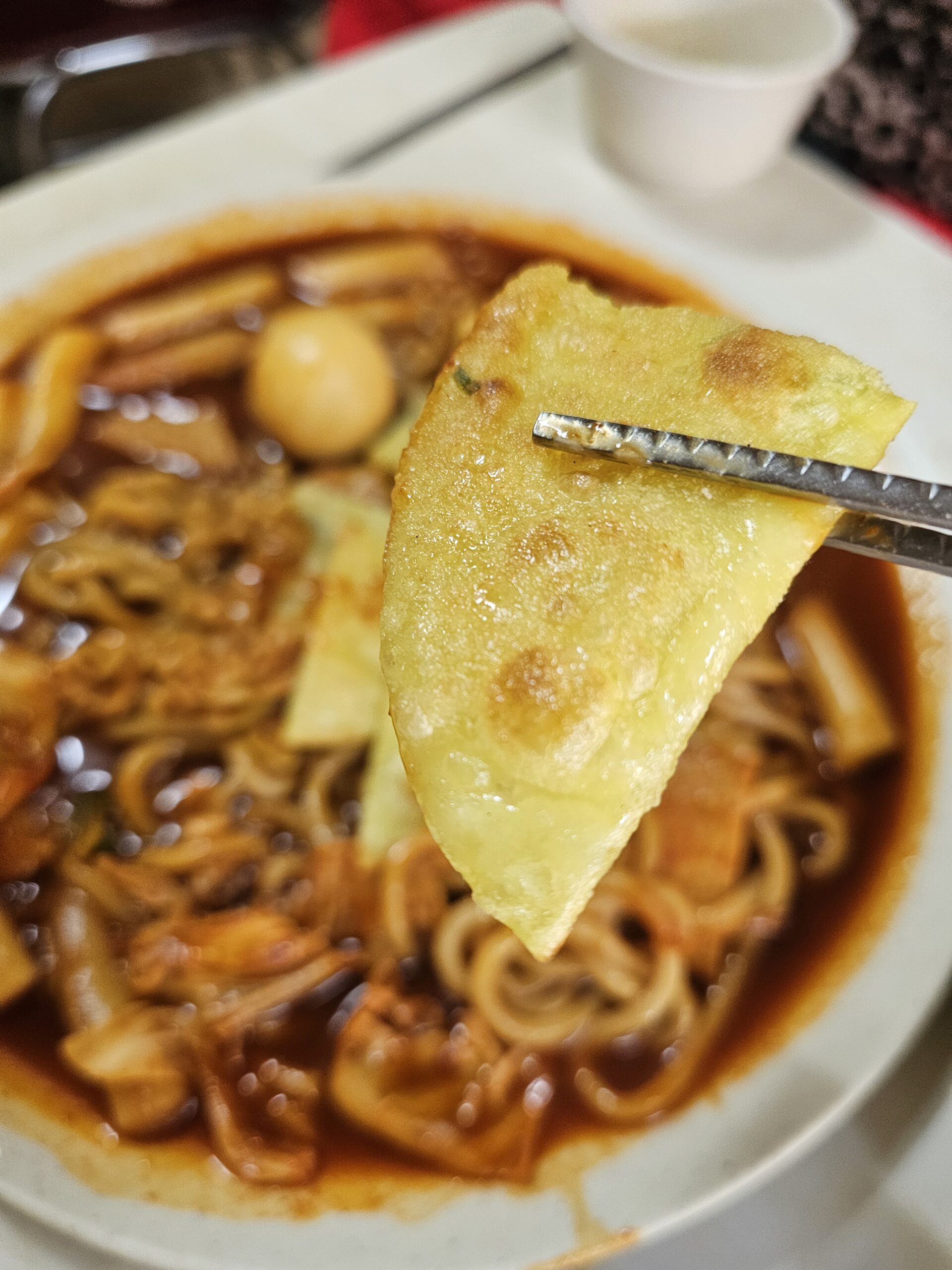Flat dumpling with golden-brown cooking marks